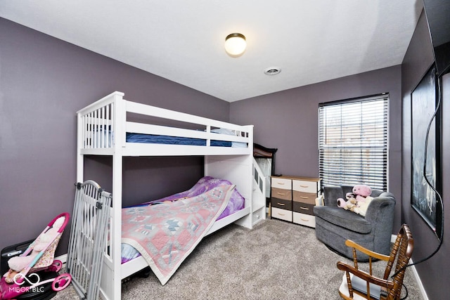 bedroom featuring carpet