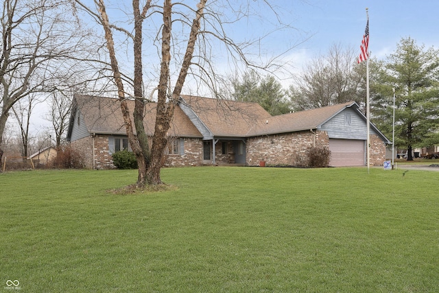 ranch-style house featuring a garage and a front lawn