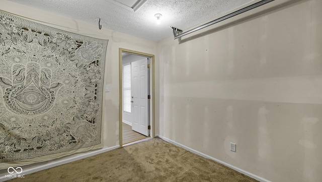 interior space with a textured ceiling