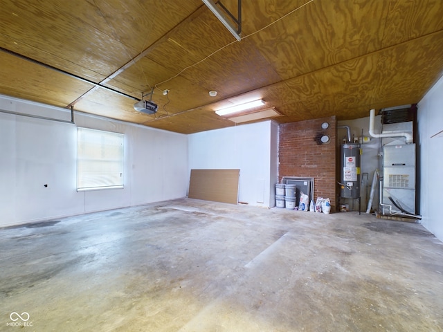 garage with gas water heater, a garage door opener, and heating unit