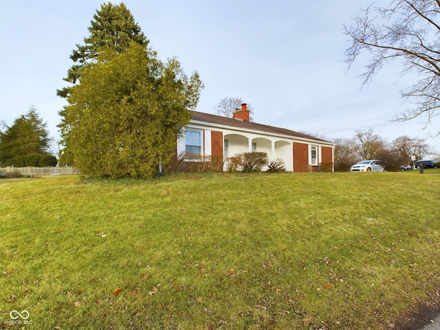 view of front of house with a front lawn