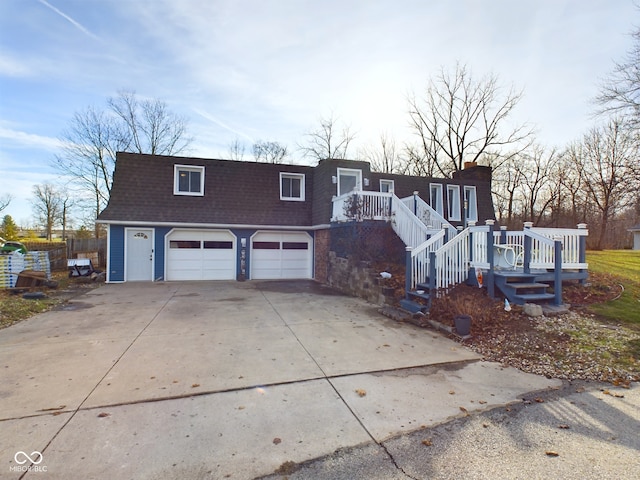 view of front of home with a garage