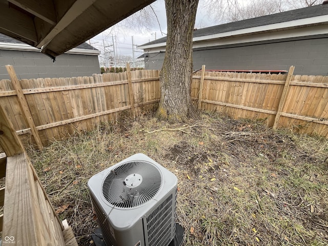 view of yard featuring central AC unit