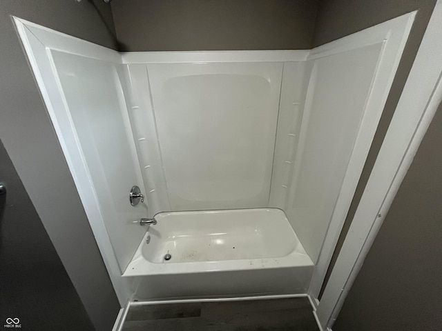 bathroom featuring washtub / shower combination