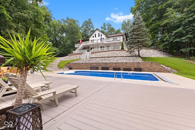 7701 Center Lake Rd, Nineveh, IN 46164 - swimming pool featuring a deck, stairway, and a lawn