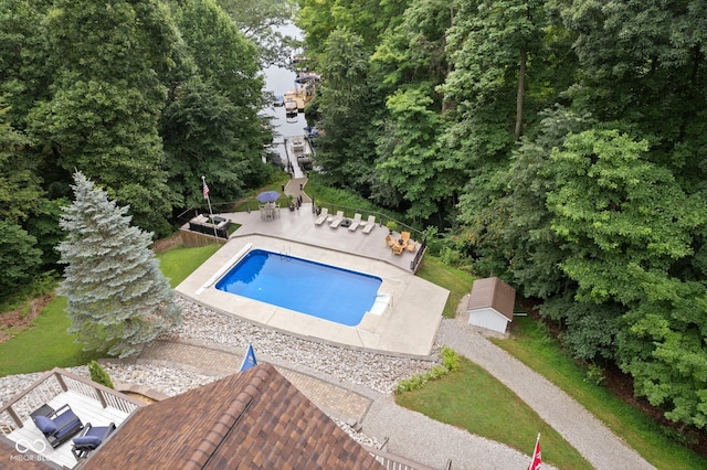 view of swimming pool with a patio