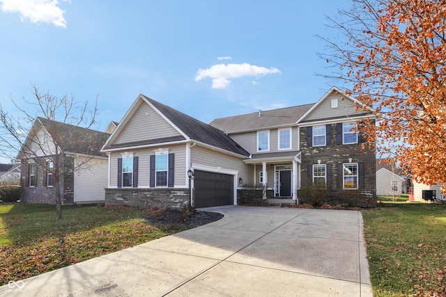 view of front of property with a garage and a front yard