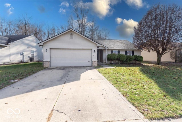 ranch-style home with a front lawn and a garage