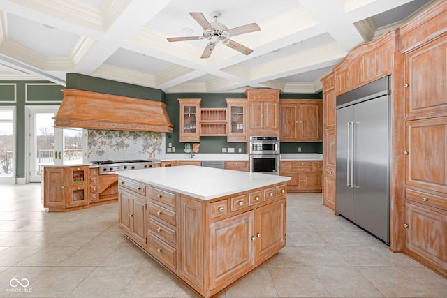 kitchen featuring decorative backsplash, appliances with stainless steel finishes, custom range hood, light tile patterned floors, and a kitchen island