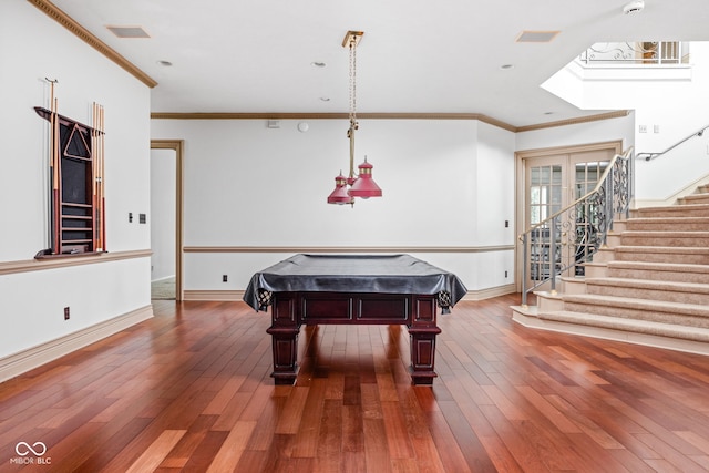 playroom featuring pool table, dark wood-type flooring, french doors, and ornamental molding