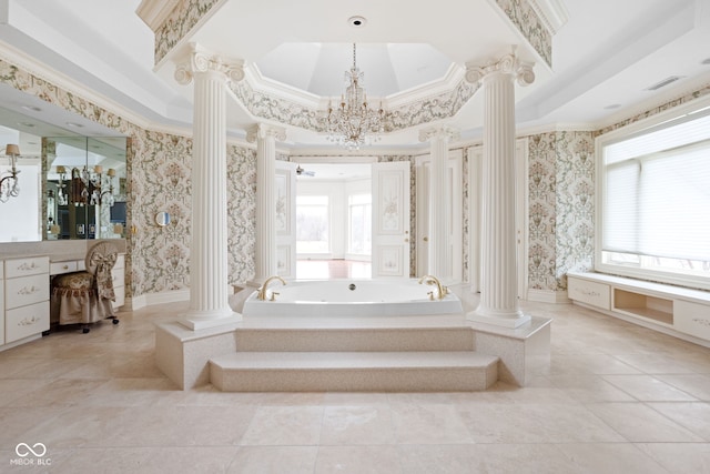 bathroom with ornate columns and a wealth of natural light