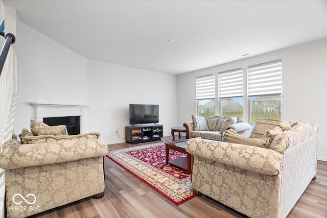 living room with hardwood / wood-style flooring