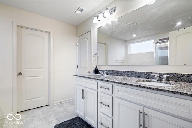 bathroom featuring vanity and walk in shower