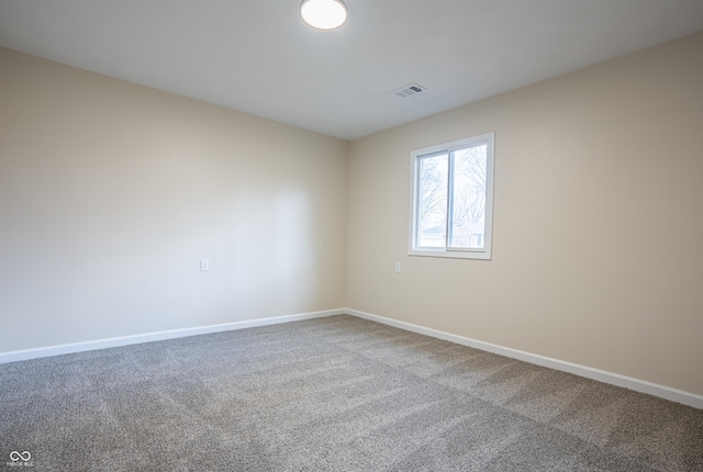 view of carpeted spare room