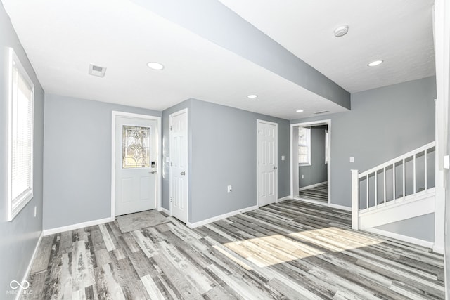 entryway with wood-type flooring