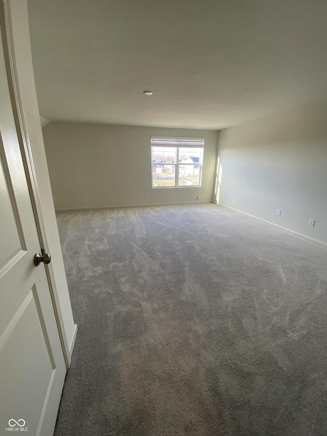 empty room with carpet flooring