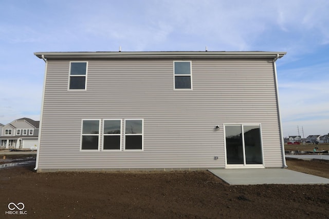 rear view of property with a patio area