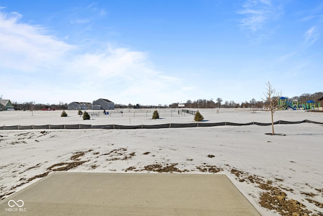 view of yard covered in snow