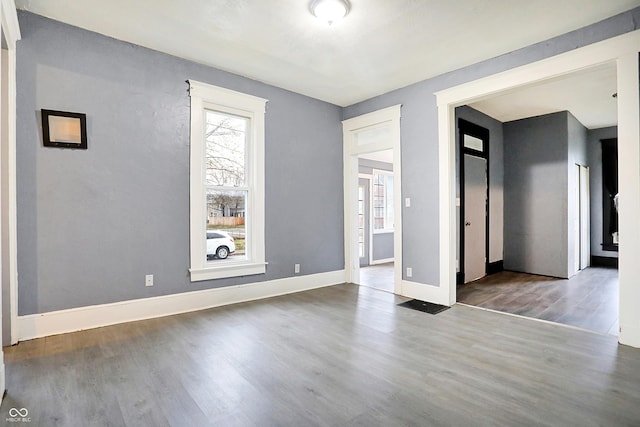 spare room featuring hardwood / wood-style flooring