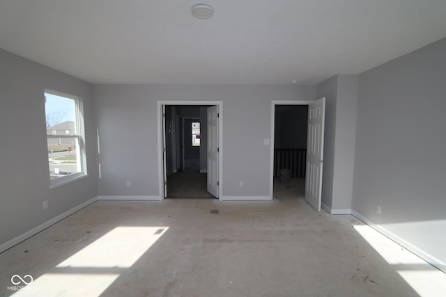 unfurnished bedroom featuring connected bathroom