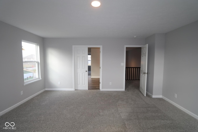 unfurnished bedroom featuring carpet floors