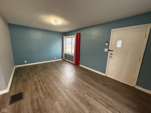 entrance foyer featuring wood-type flooring