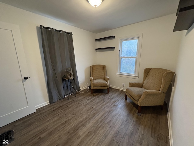 sitting room with hardwood / wood-style floors