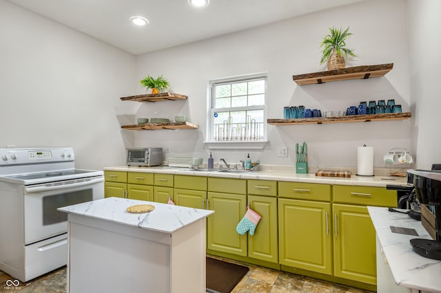 kitchen with sink, a kitchen island, white electric range oven, and green cabinetry