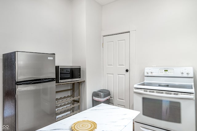 kitchen with appliances with stainless steel finishes