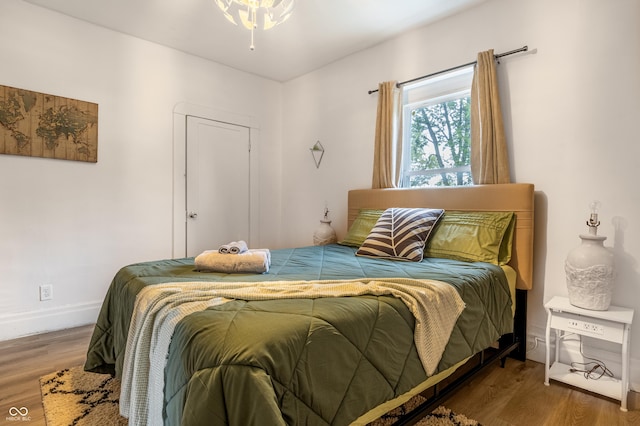 bedroom featuring hardwood / wood-style flooring