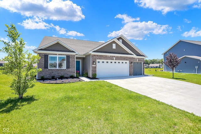 view of front of property featuring a garage and a front lawn