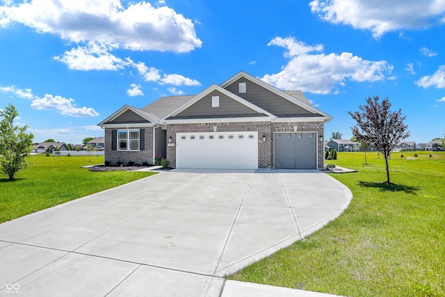 view of front of house featuring a garage and a front lawn