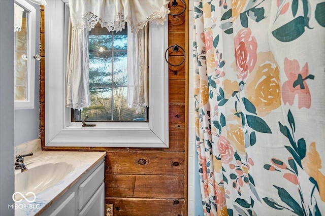 bathroom featuring vanity and walk in shower