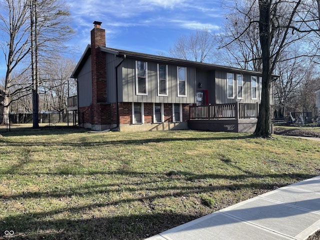 bi-level home with a front yard