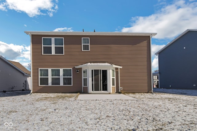 rear view of property featuring a patio