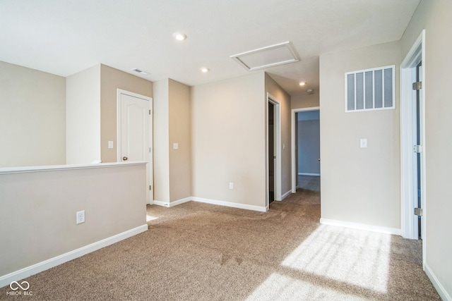 unfurnished room featuring carpet floors