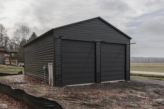 view of outdoor structure featuring a garage