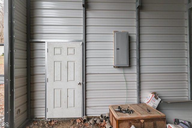 property entrance featuring electric panel