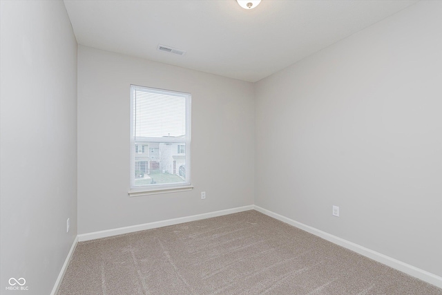 empty room with carpet flooring