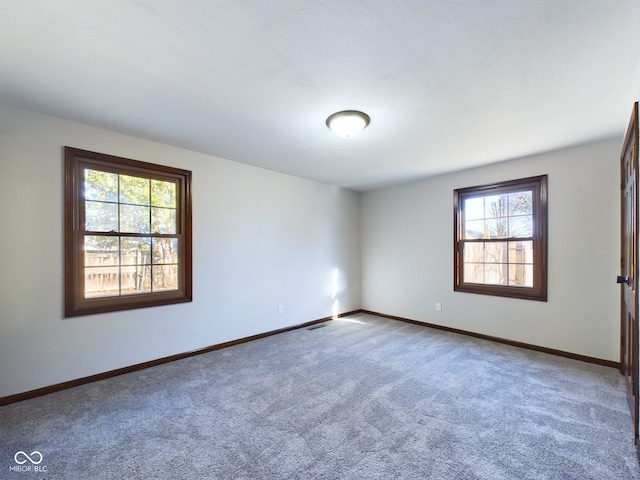 view of carpeted spare room