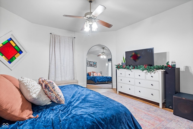 bedroom featuring ceiling fan and light hardwood / wood-style floors