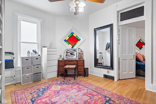 interior space with light hardwood / wood-style flooring and ceiling fan