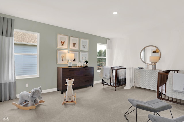 living area featuring light colored carpet