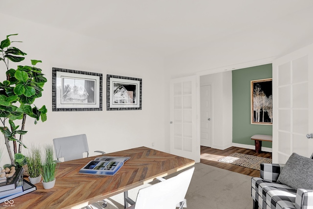 office area featuring hardwood / wood-style flooring and french doors