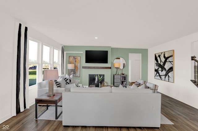 living room featuring dark hardwood / wood-style flooring