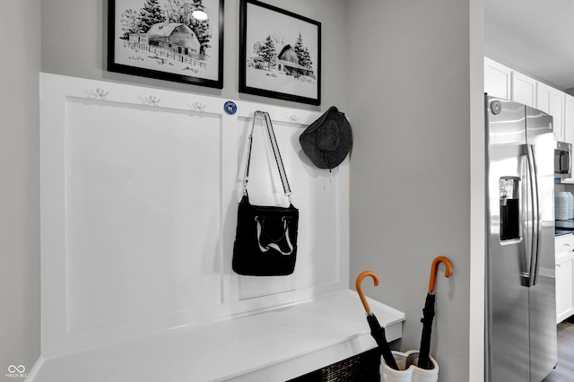 mudroom featuring wood-type flooring