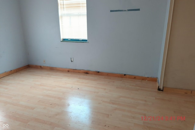 empty room featuring light hardwood / wood-style floors