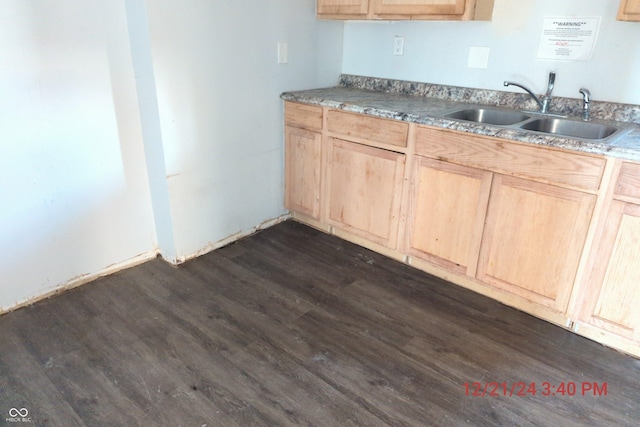 kitchen with sink and light brown cabinets