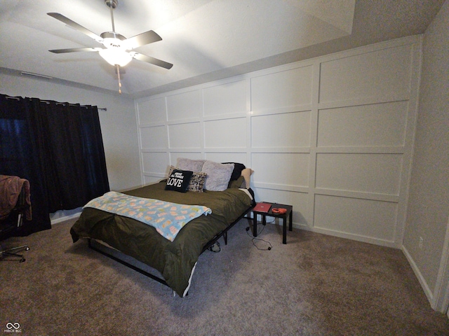 bedroom with ceiling fan and carpet