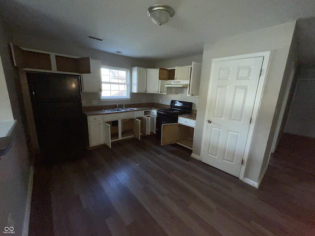 6215 E 11th St, Indianapolis, IN 46219 - kitchen with black appliances, under cabinet range hood, dark wood-style floors, and white cabinets